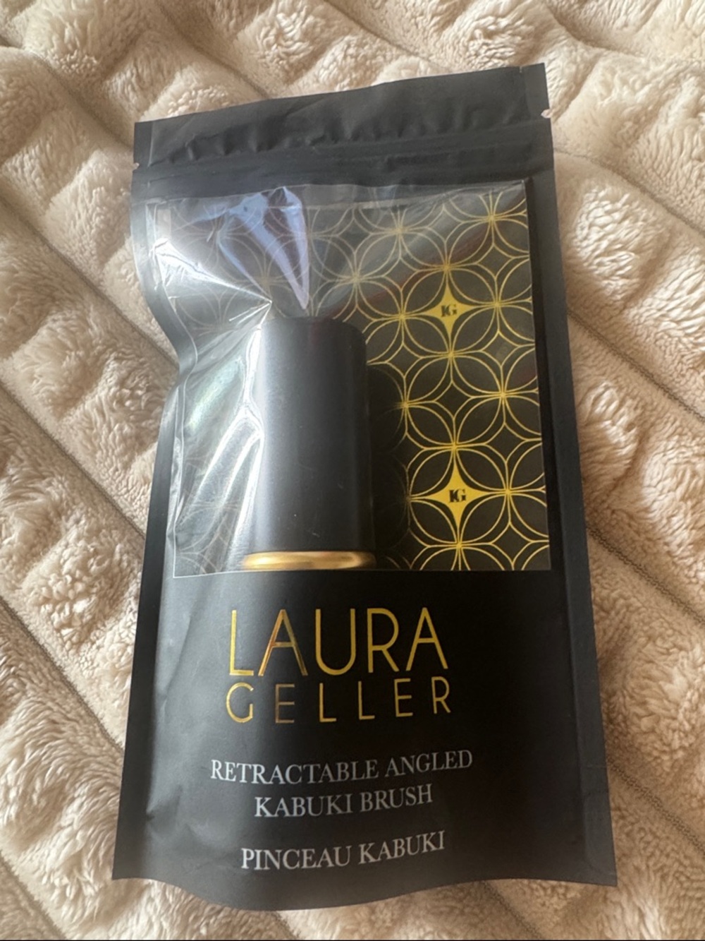 Laura Geller Black and Gold Retractable Angled Kabuki Brush
